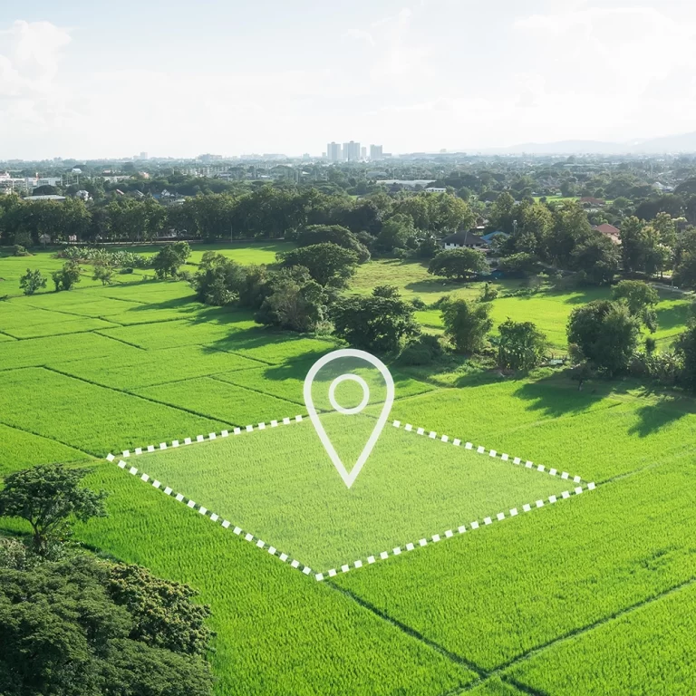 Land with pin